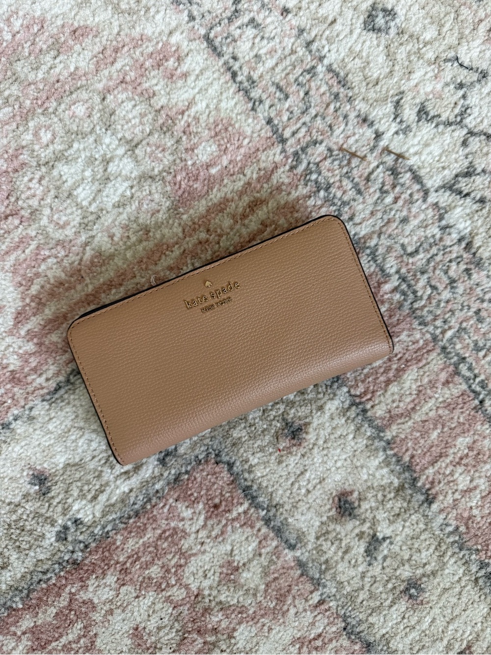 kate spade Pebbled Leather Zip Wallet in Tan